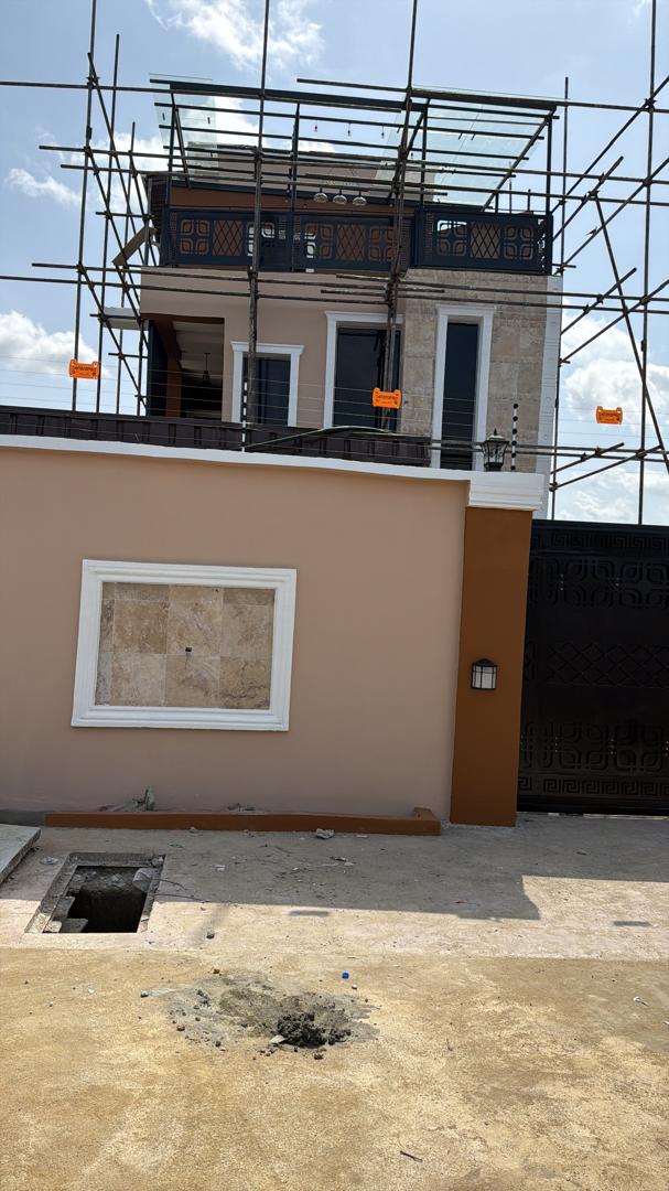 Front elevation during final external works